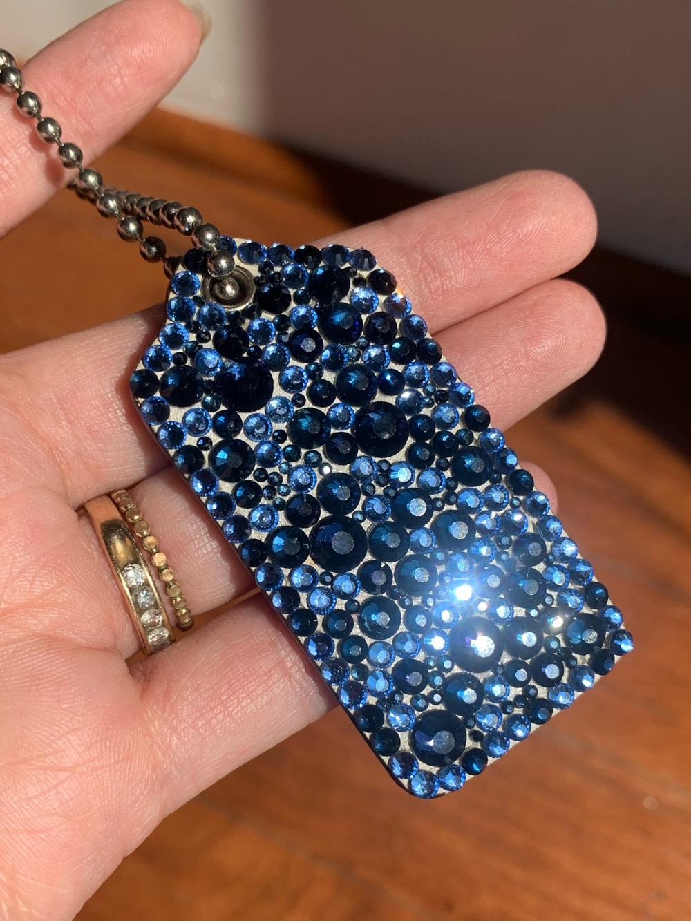 Coach Cream Leather Hangtag with Blue Glass Rhinestones